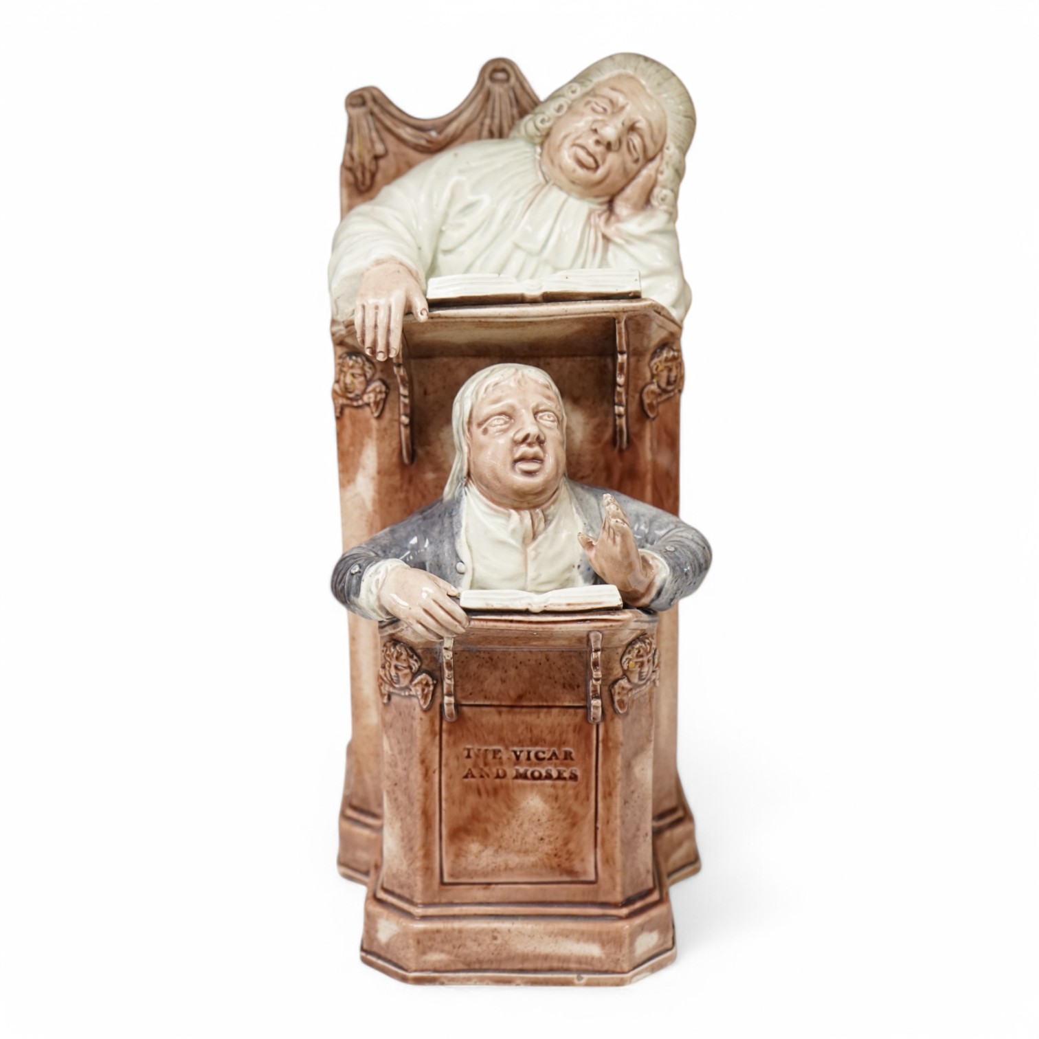 A late 18th century Ralph Wood type creamware Vicar and Moses group, 24cm high. Condition - restored